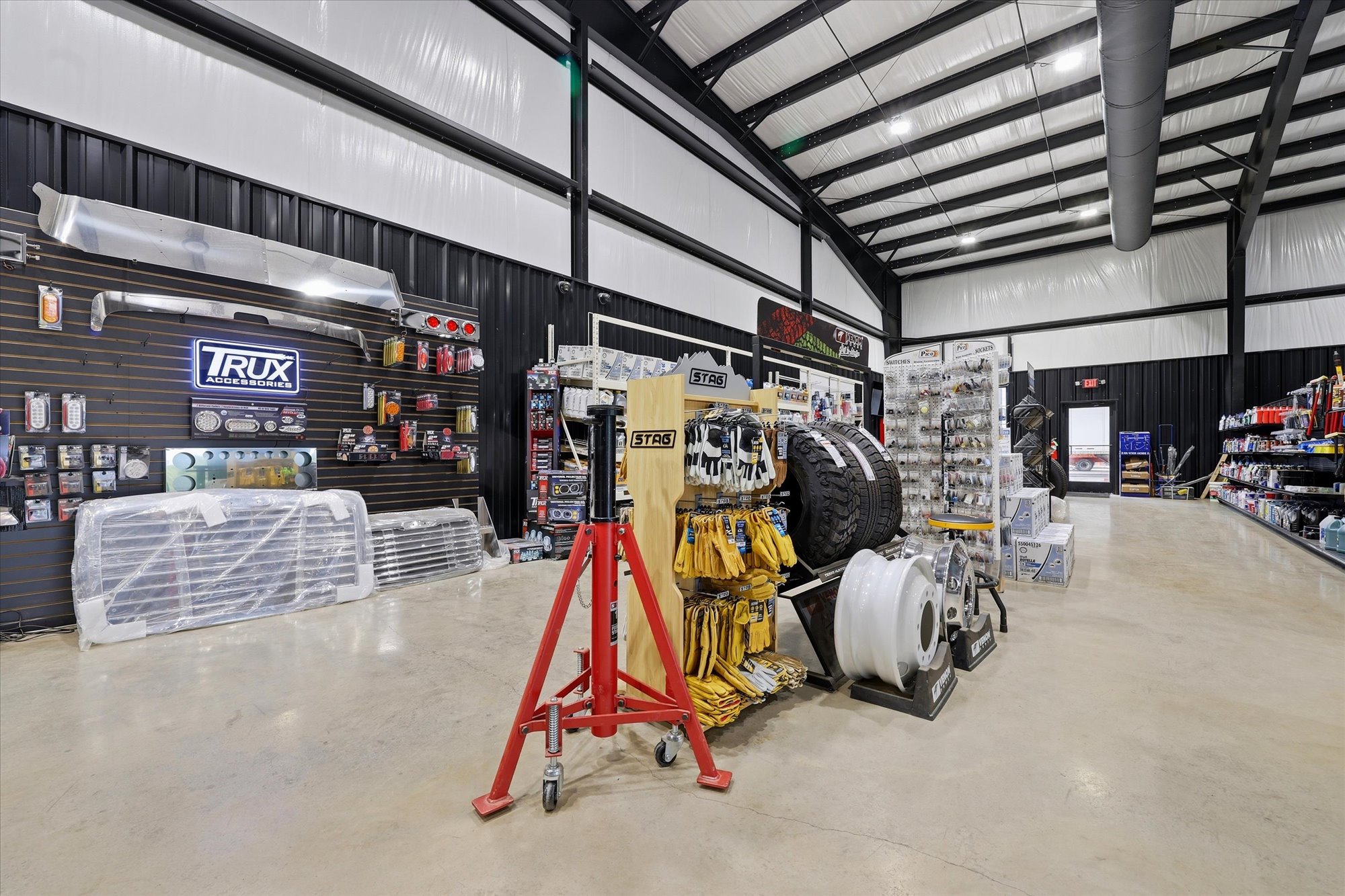 Wilkerson big-truck parts retail floor with tire and accessory displays