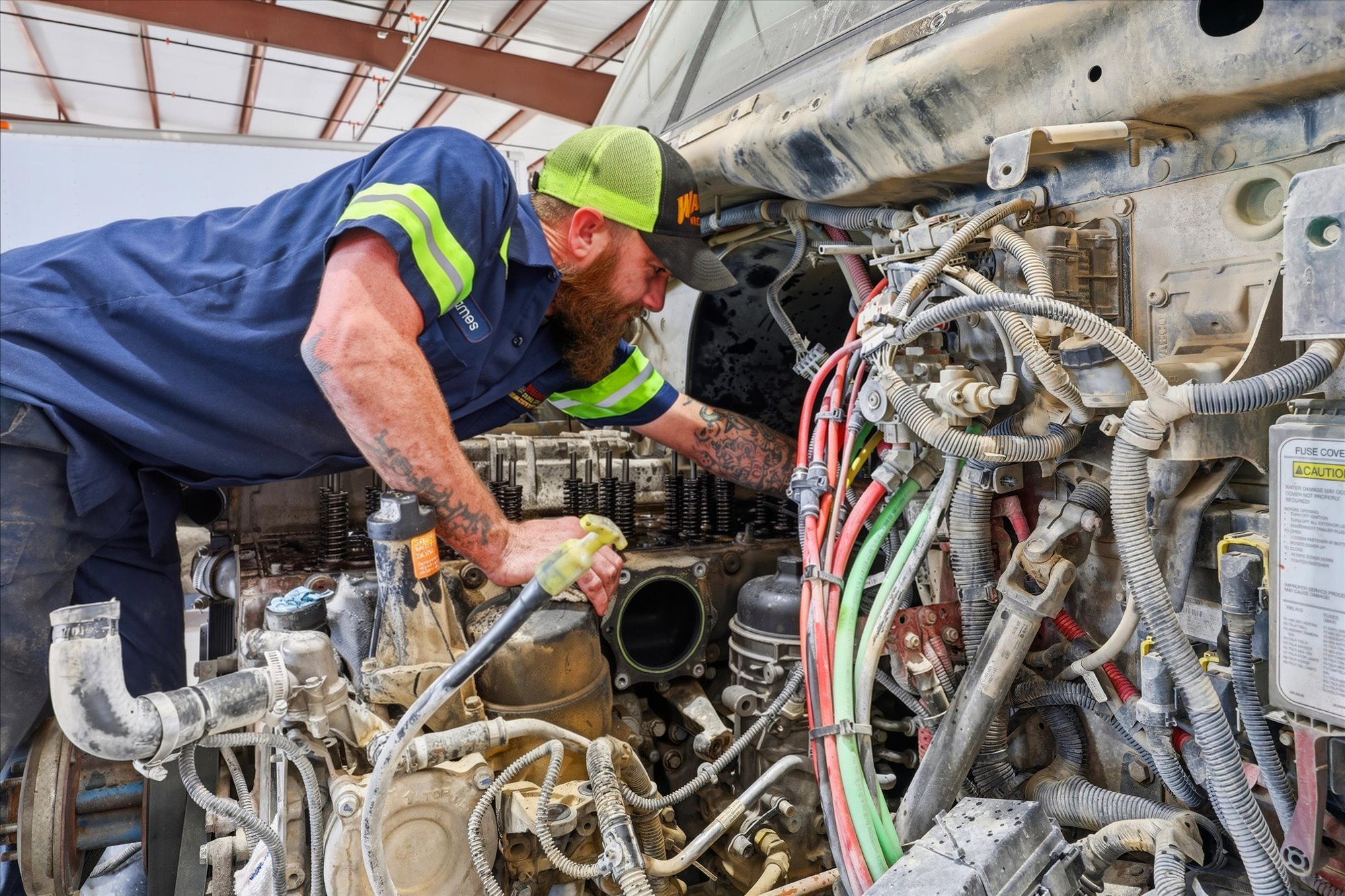 Wilkerson diesel technician working on a heavy-duty engine